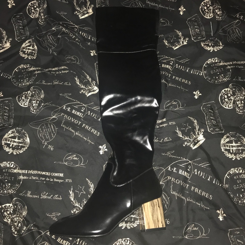 Never worn! Over the knee boots.